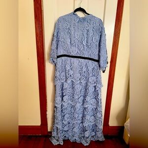 Light blue with embroidered flowers size 18 Malka Majesty wedding gown
Worn once